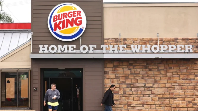 In the image there is burger king resturant and is launching Burger King $5 value meal. There is logo of Burger king and the line is written as Home of the whopper.