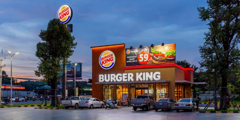 The image shows the burger king restutrant on memorial day. There is logo of BK and burger on the screen.