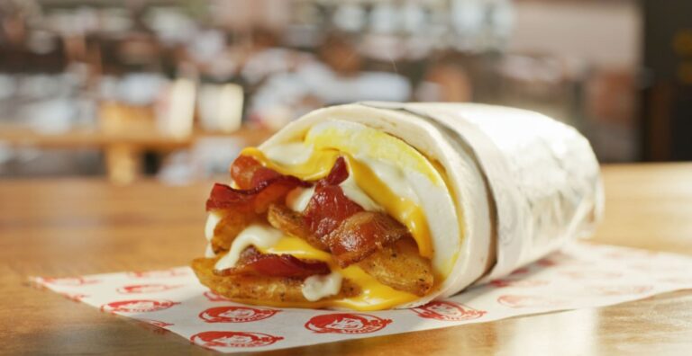 the image shows the Burger King Breakfast Burrito Recipe wrapped into the foil. it is on the table and ready to serve.