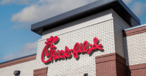 The image shows the chick-fil-a restaurant opens on halloween.