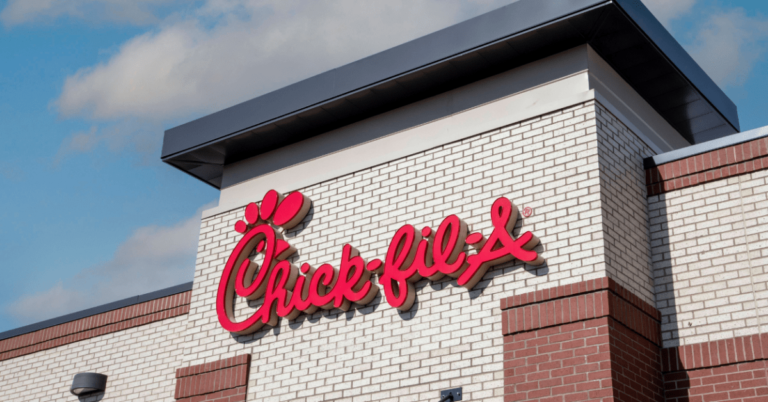 The image shows the chick-fil-a restaurant opens on halloween.