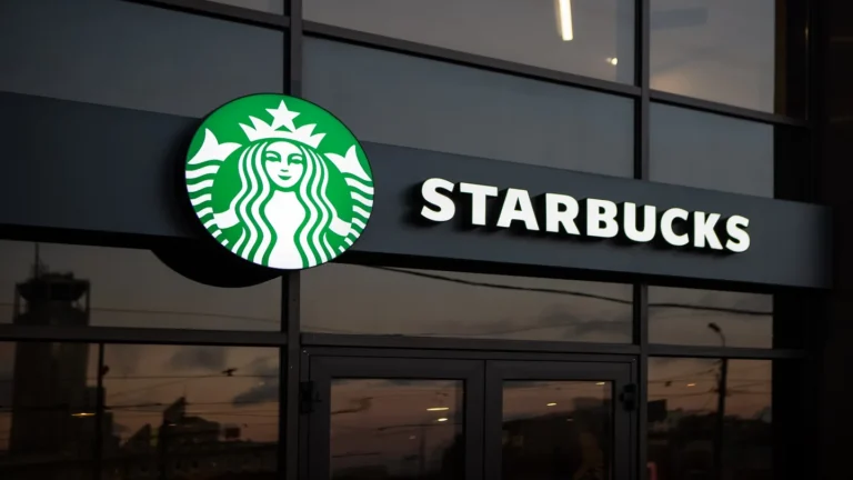 The image shows the starbucks written in white color and the logo left side it best depicts starbucks franchise costs requirements opportunities