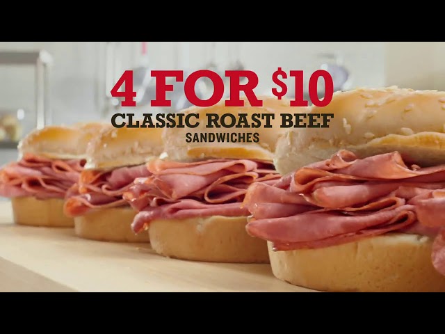 there is arbys 4 for $10 deal written and the sandwich in the back.