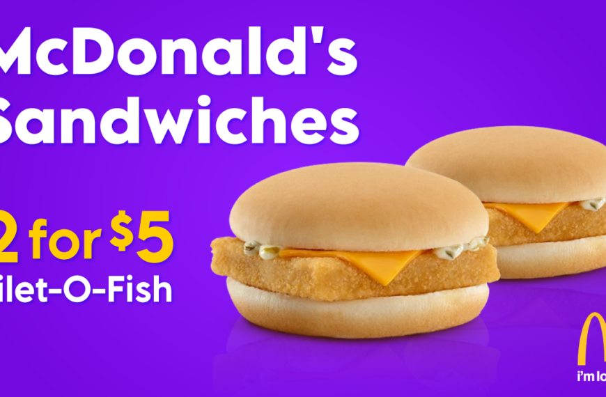 McDonald's advertisement for Filet-O-Fish sandwiches. Two Filet-O-Fish sandwiches are shown on a purple background. The text "McDonald's Sandwiches," "2 for $5," "Filet-O-Fish," and "I'm lovin' it" is also included.