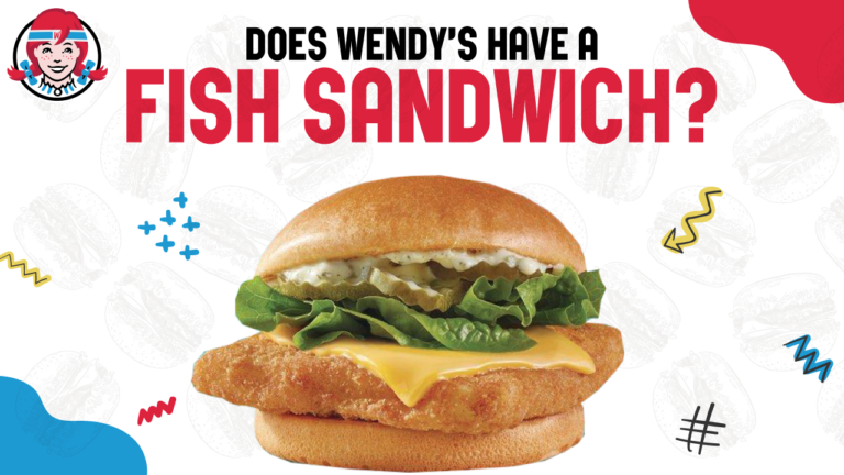 A close-up of Wendy's Crispy Panko Fish Sandwich with melted cheese, pickles, lettuce, and tartar sauce on a toasted bun. Banner image asking "Does Wendy's have a fish sandwich?" with a picture of their Crispy Panko Fish Sandwich