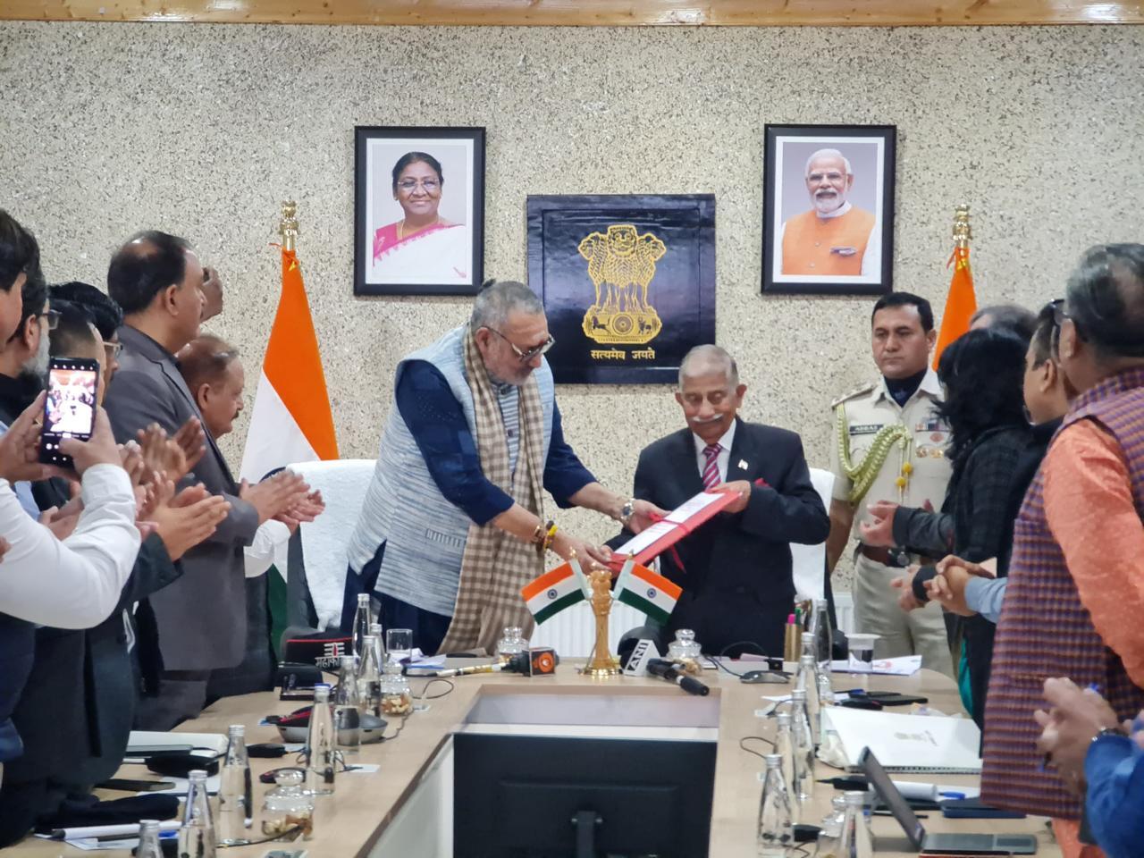 Union Minister Giriraj Singh hands over the certificate of GI tag for Pashmina wool to LG Ladakh